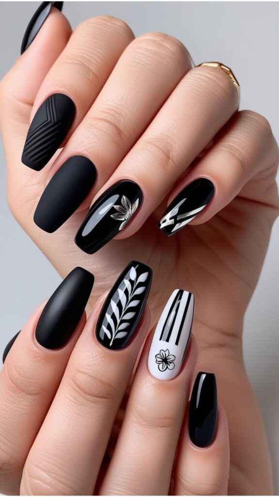 Pair of Hand with black nail designs, showcasing different finishes and design variations.