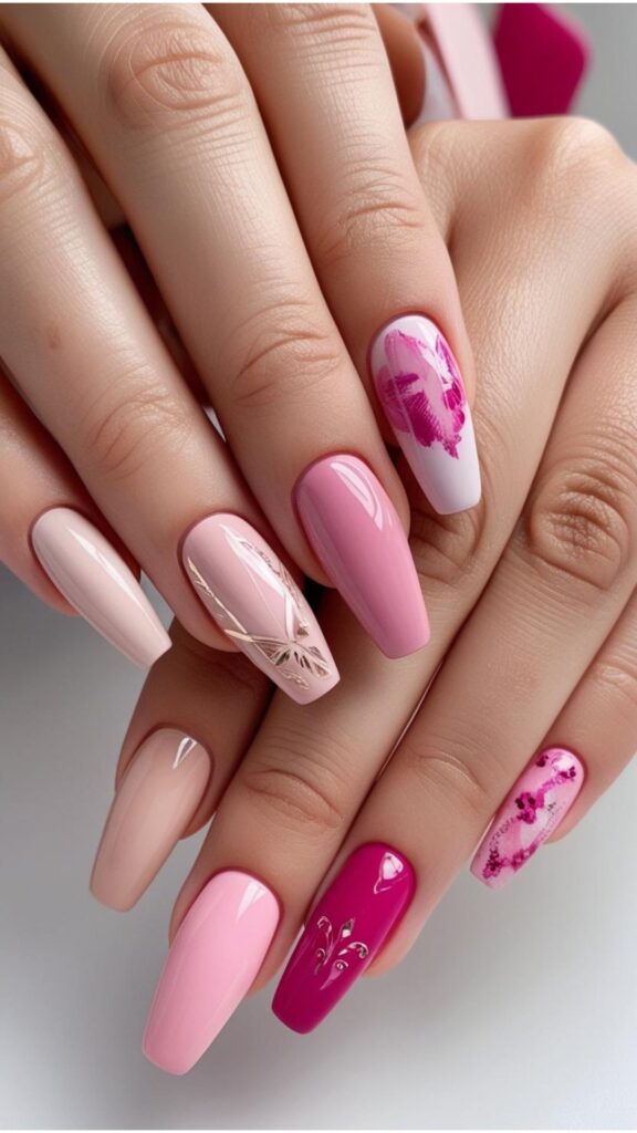 Hands with pink nail designs, showcasing various shades of pink and design variations