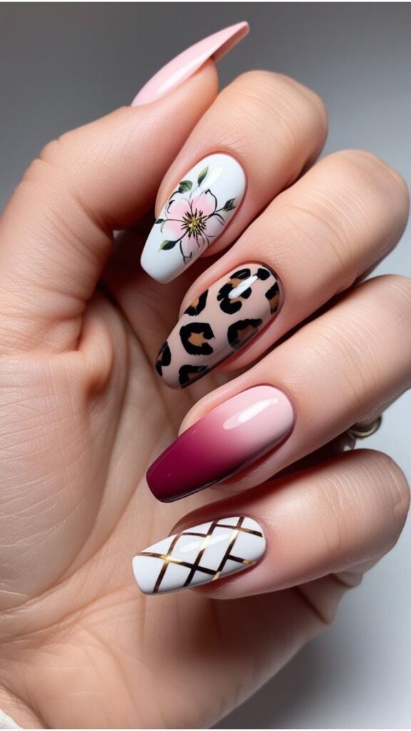 Hand featuring different short nail designs: floral, geometric, animal print, ombre, and negative space.