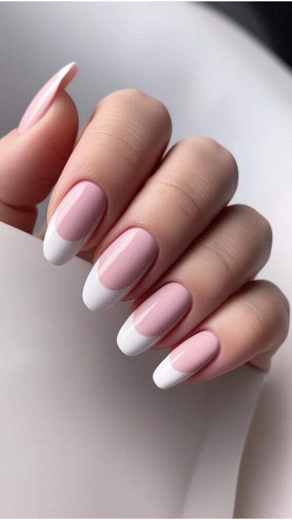 A set of short nails with a classic French manicure.